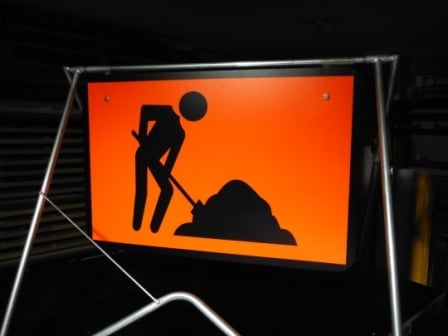 Workmen Ahead sign Fluro sign