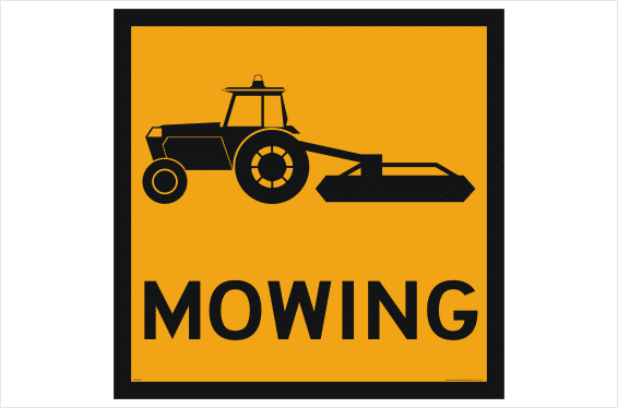 Mowing ahead sign