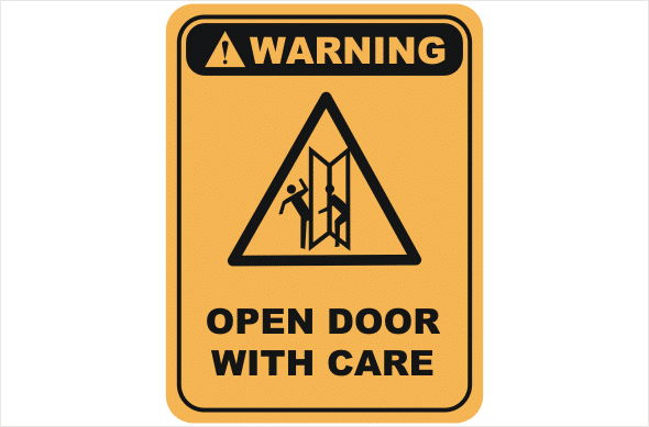 Open door with care warning sign